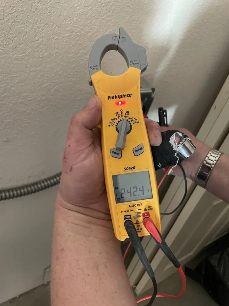 Voltage testing with clamp meter during Ceiling Fan Installation in Conshohocken